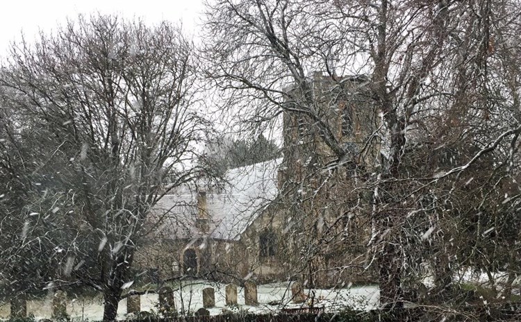 church from vicarage in winter